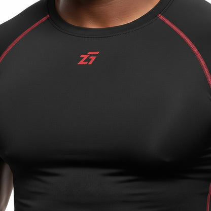 Zigueii Agborlor compression t-shirt in black with red contrast stitching and logo detail on the chest.