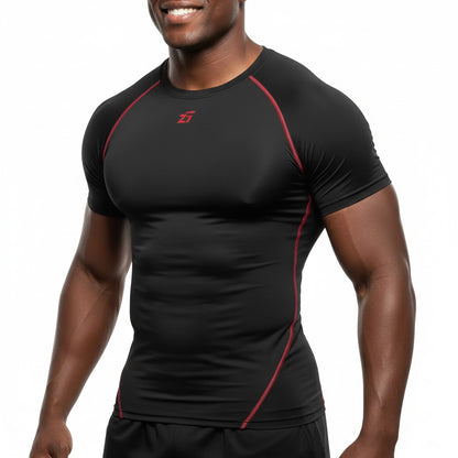 Zigueii Agborlor compression t-shirt in black with red flatlock seams and logo on a smiling male athlete.